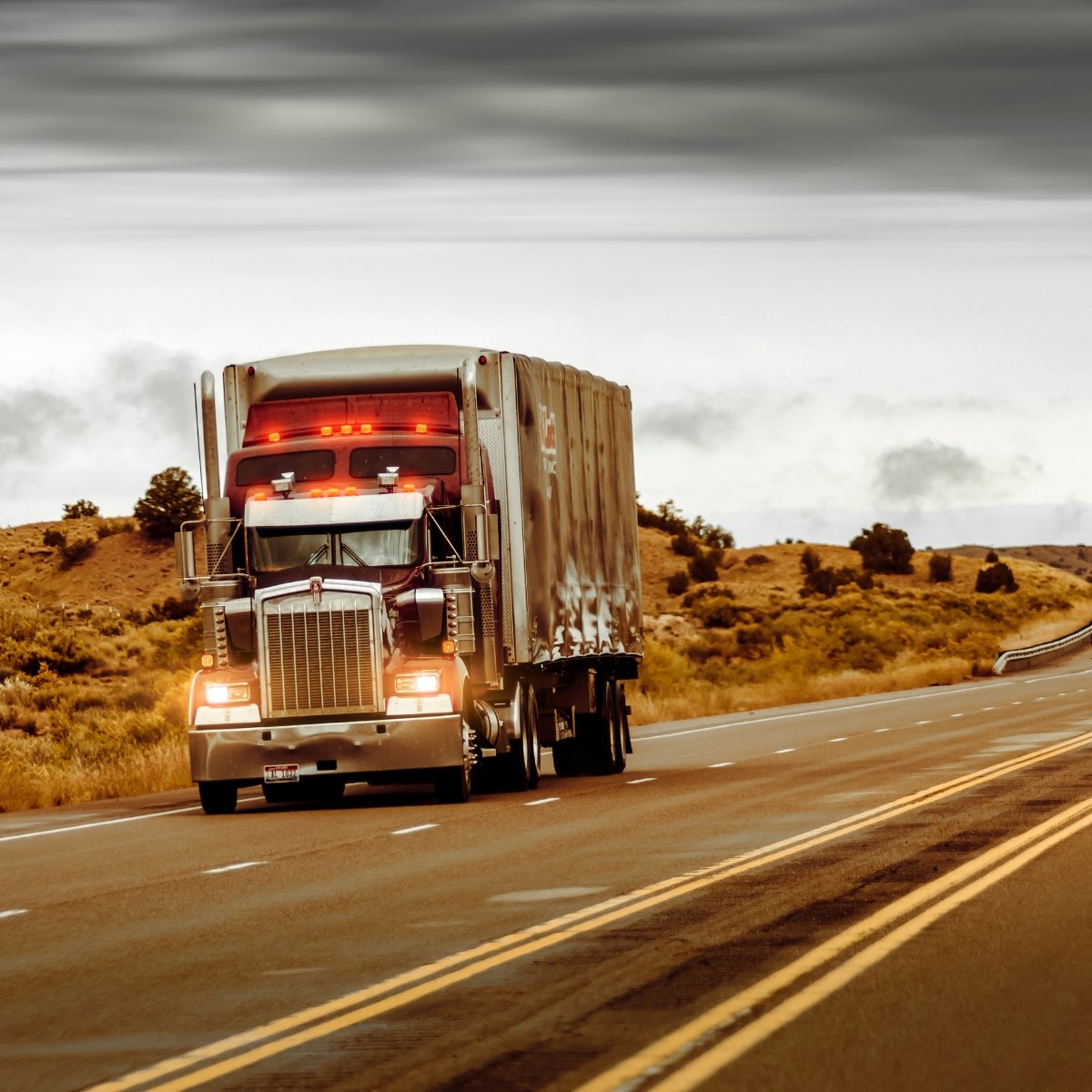 A commercial truck traveling on a highway